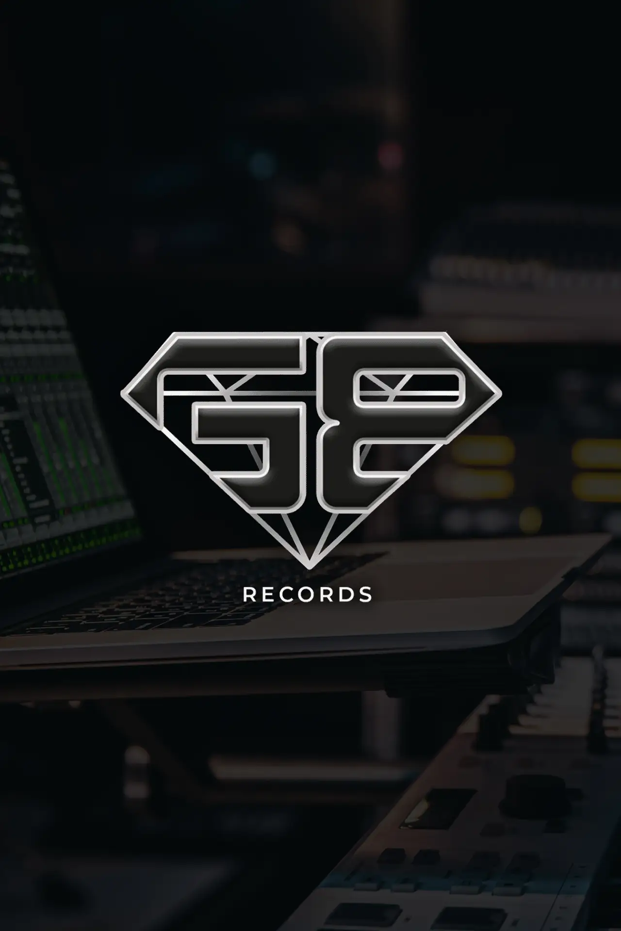 a laptop with a diamond logo